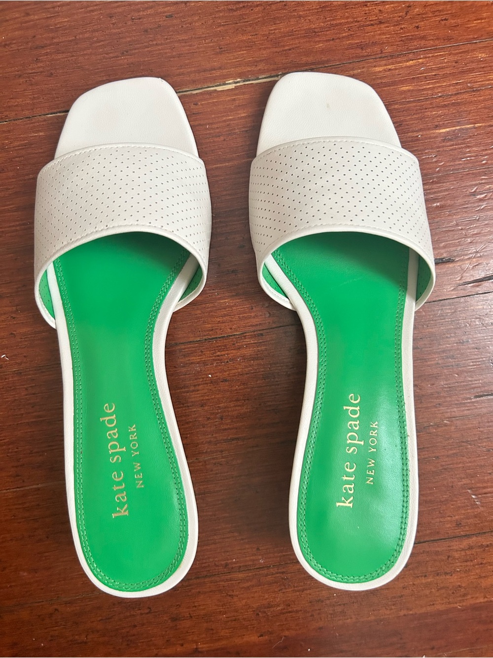 kate spade White Perforated Slide Sandals with Green Footbed